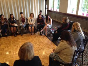 Gloria Steinem speaks with a group of students from the Care Center in Holyoke.