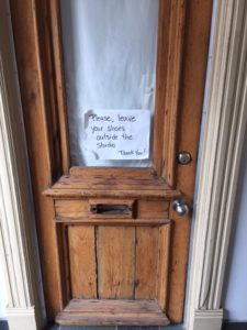 A door made of reclaimed wood at Emmanuel Cosgrove's LEED certified home.
