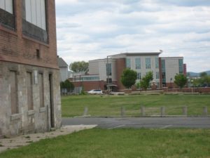 In the foreground, the Elias Brookings School building, which was damaged by the tornado and in the background the new $27.5 million Elias Brookings School.