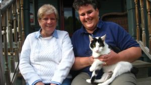Rosemary Morin and Alicia Zoeller and Dorothy, the kitten they rescued after the 2011 tornado in Springfield, Mass.