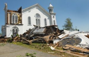 The First Church of Monson's steeple lay in ruins on the ground after the June 1, 2011, tornado.