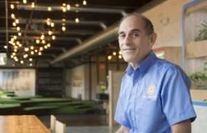 Michael Sundel is the owner of Mill180 Park. He has a background in software design and has always had a fascination with parks, so he decided to combine his interests to create a technology-driven indoor park. (Katherine Davis-Young for NEPR)